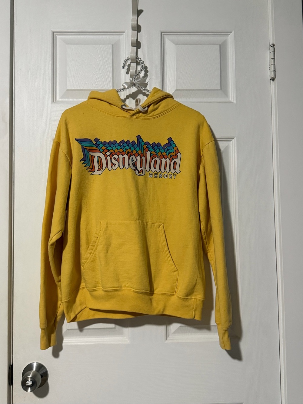 Disney Yellow Pullover Hoodie with Colorful Disneyland Logo